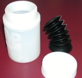 Medium diameter plastic reservoir with offset outlet - Feature Image